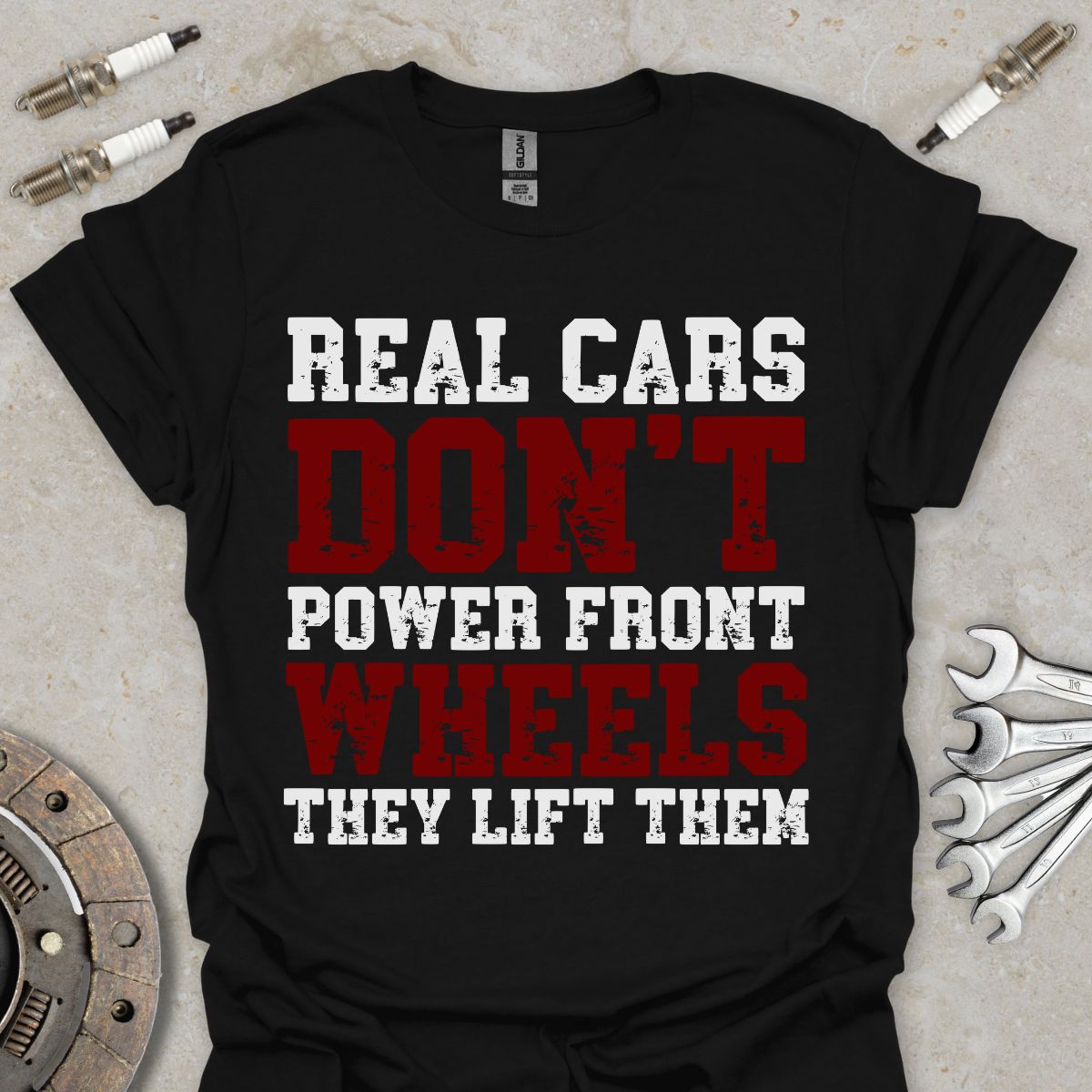 Real cars don't Power Front Wheels T-Shirt